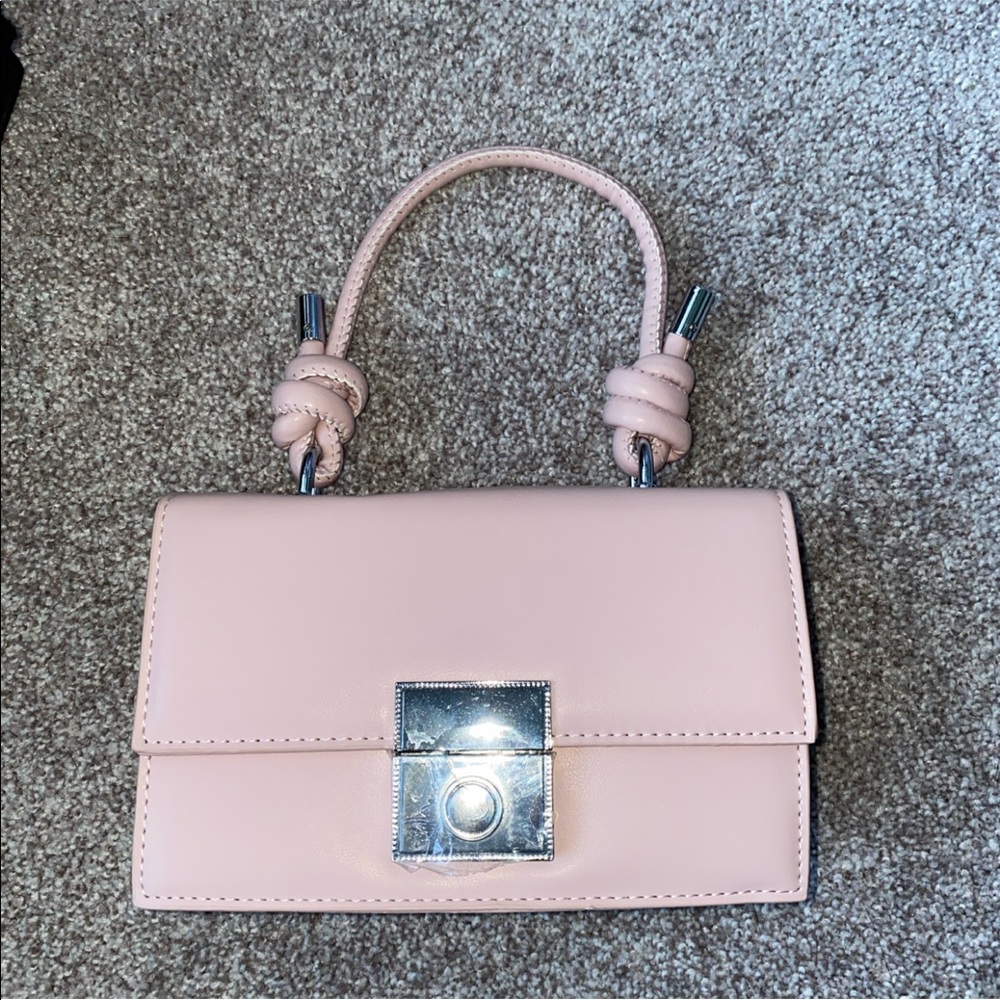 Never used. Can be used as crossbody or Handbag